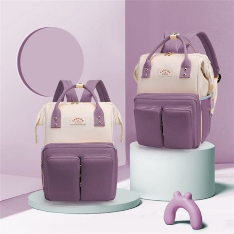 sac-à-dos-à-langer-mauve